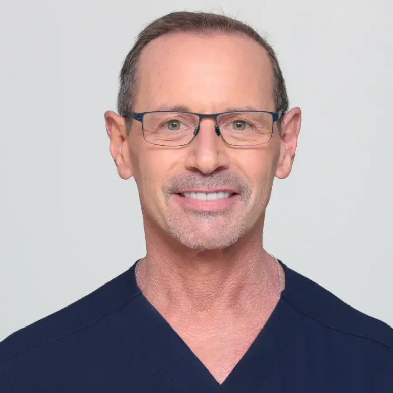 Dr. Lee M. Mandel, double board-certified otolaryngologist and facial plastic surgeon